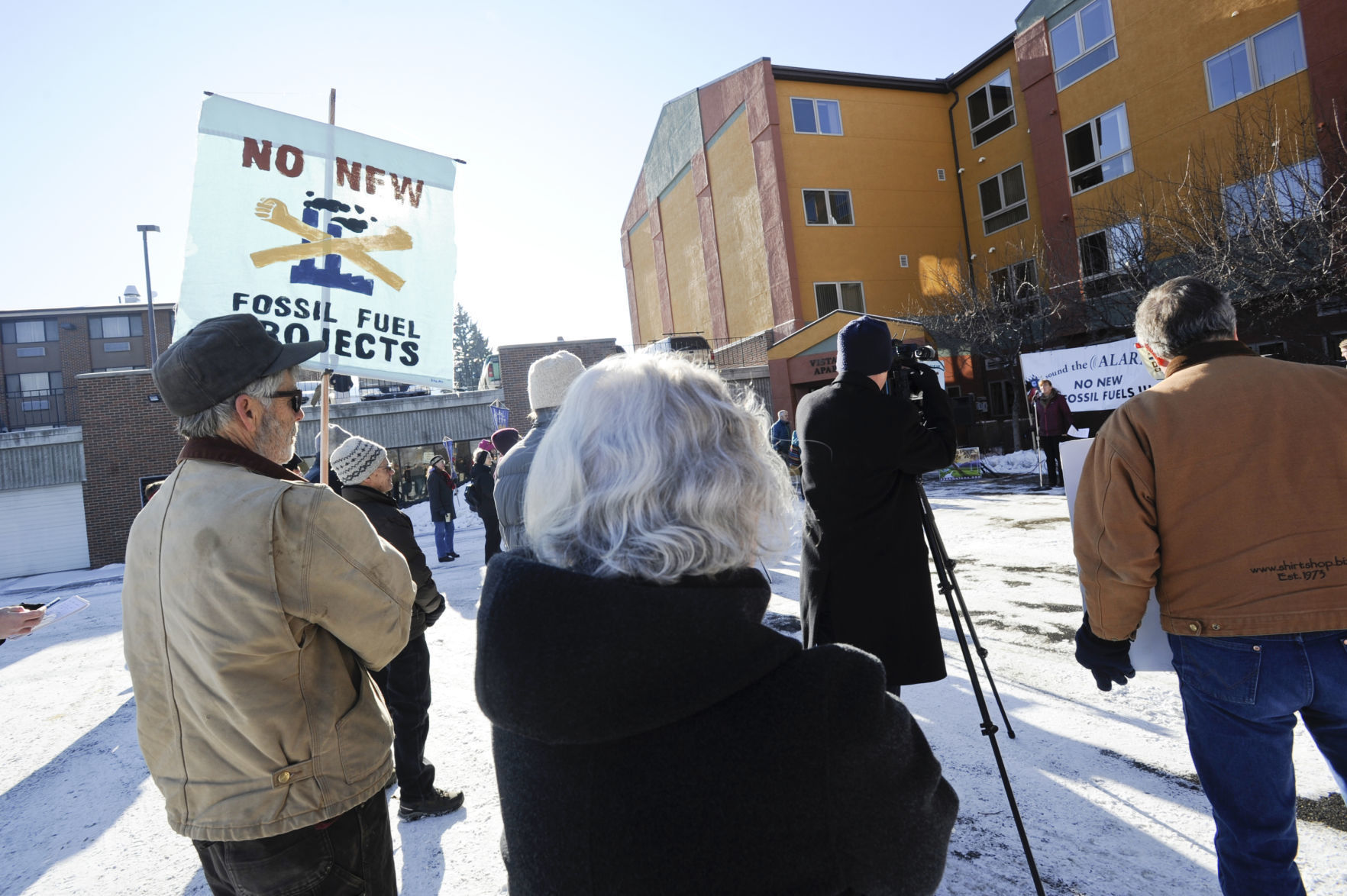Protestors gather outside the Public Service Commission Monday